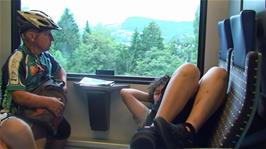 John and Lawrence enjoying the train journey from Brunnen to Lucerne after our 33.4 cycling miles from Hospental